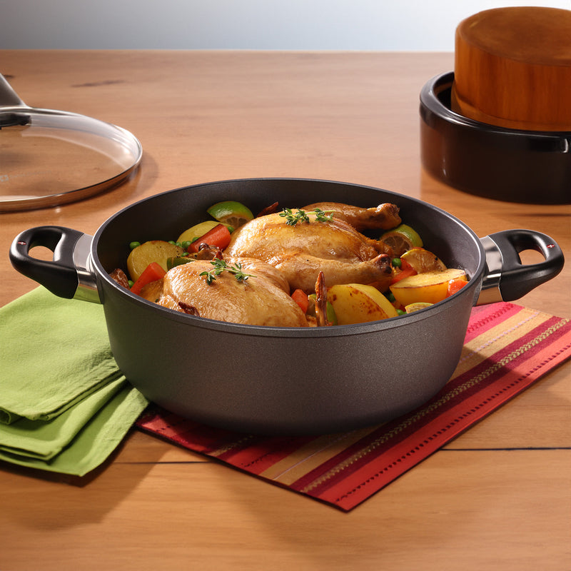 HD Nonstick Braiser with Glass Lid in use on wooden table