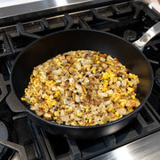 CHD Nonstick 5.8 qt Saute Pan on gas stove with food inside