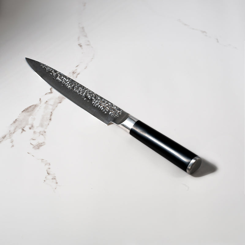 8" Hammered Carving Knife on Kitchen White Marble counter